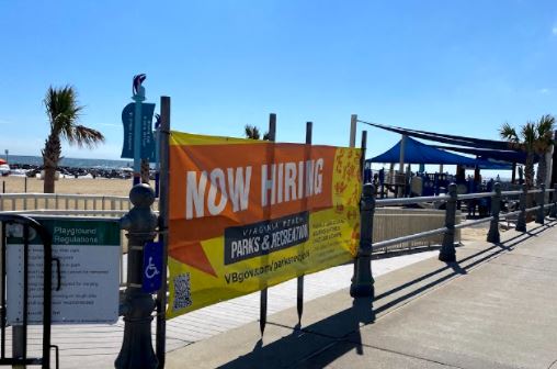The rec centers are advertising their openings on massive signs at the oceanfront.