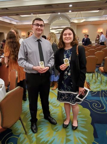 Seniors Emily Euler and Lucas Gordon accept their Brickel Scholar awards. (Photo by: K. Euler)